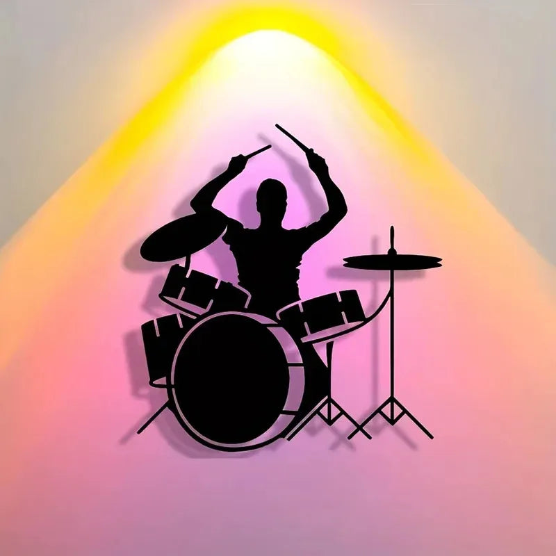 iron wall decoration playing drums