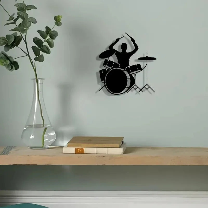 iron wall decoration playing drums